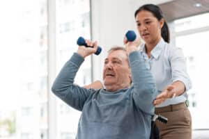 rehabilitation patient working with skilled nurse
